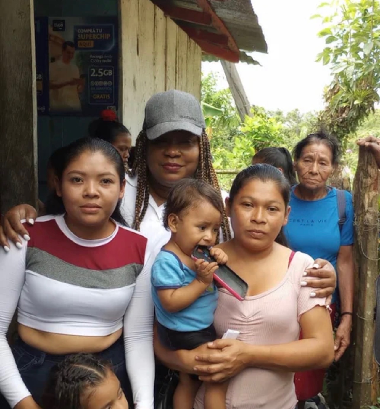 Women and children gathered outside during Caribbean Compassion Mission outreach